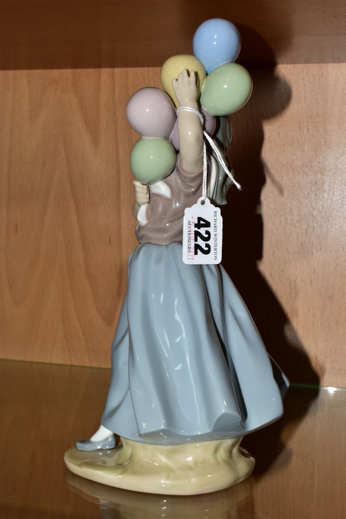 A LLADRO FIGURE 5141 'Balloon Seller', designed by Vincente Martinez, issued 1982-1996, height - Image 3 of 6