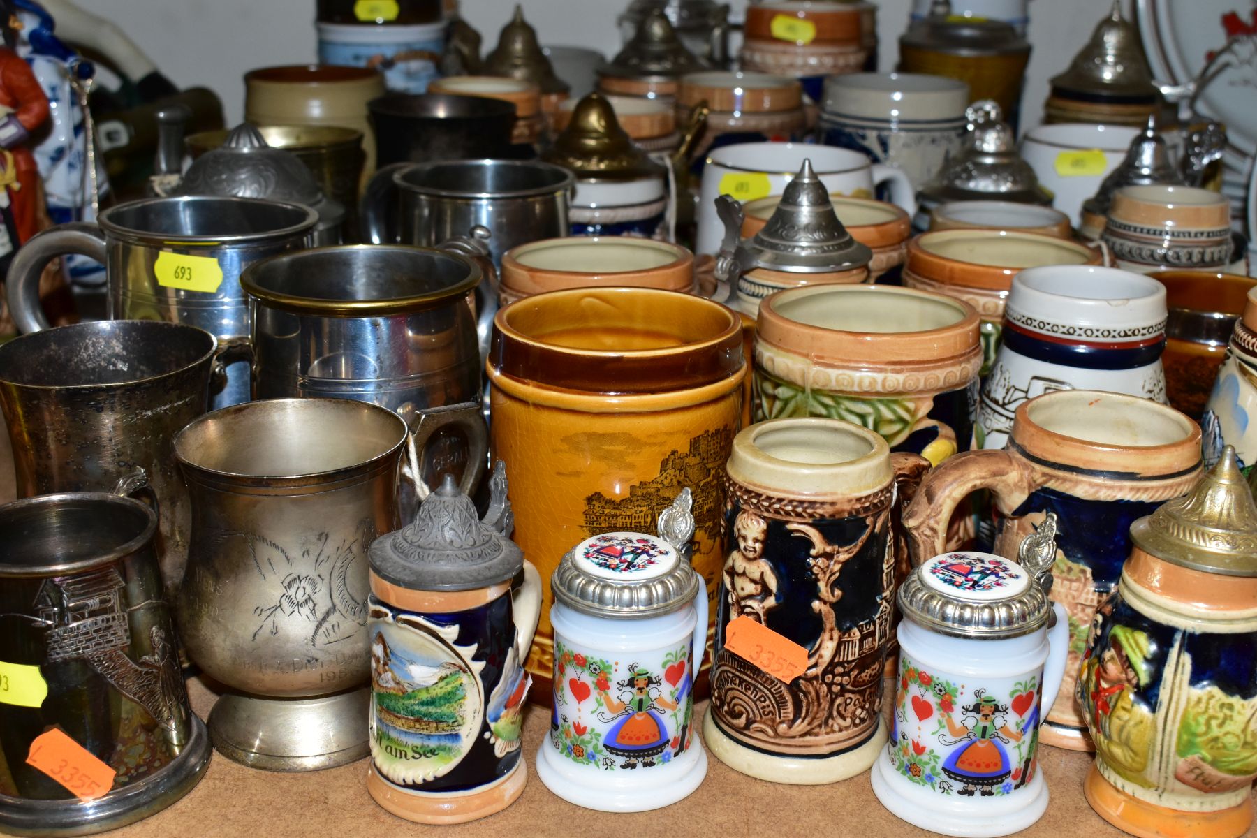 A GROUP OF STEINS, TANKARDS AND EPNS TANKARDS, including a pair of German milk glass miniature