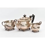 AN EARLY 20TH CENTURY THREE PIECE SILVER TEA SET, to a plain polished teapot, engraved monogram to