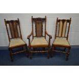 A SET OF THREE REPRODUCTION OAK CHAIRS, with a carved and bergère back, comprising an open
