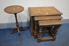 A REPRODUX OAK NEST OF THREE TABLES, width 55cm x depth 35cm x height 48cm (fluid stained) and a