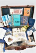 AN OLD LEATHER CASE CONTAINING MOSTLY UK COINAGE to include three small coin albums with silver