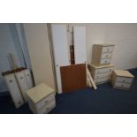 A MODERN FIVE PIECE BEDROOM SUITE comprising a double door wardrobe with three drawers (dismantled),