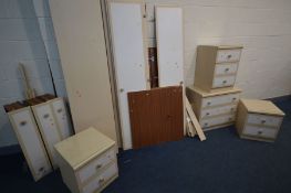 A MODERN FIVE PIECE BEDROOM SUITE comprising a double door wardrobe with three drawers (dismantled),