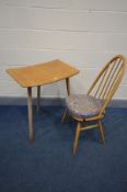 AN ERCOL ELM AND BEECH MODEL 265 TABLE, the curved top on triple square tapered legs, width 68cm x