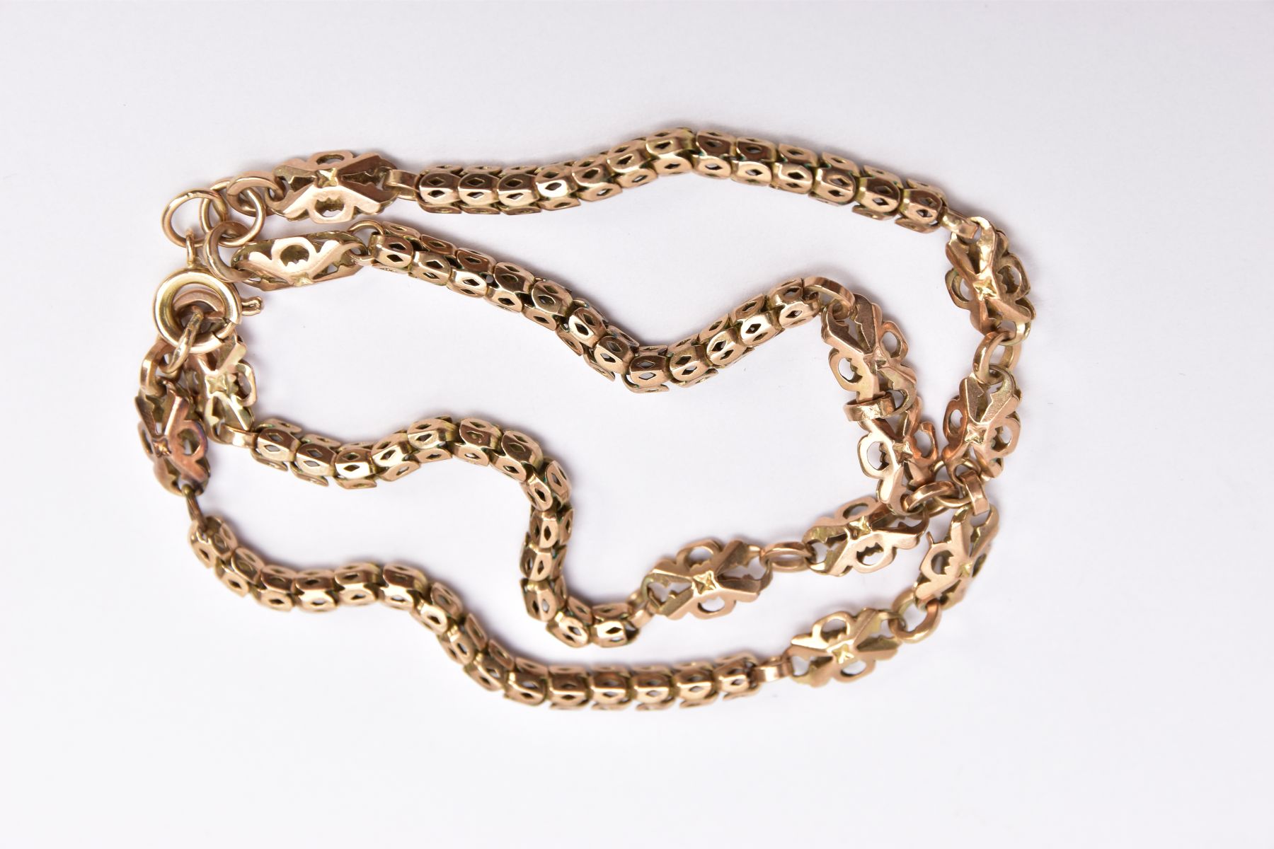 A YELLOW METAL BRACELET, two fancy openwork link bracelets joined together with jump rings, fitted - Image 2 of 2