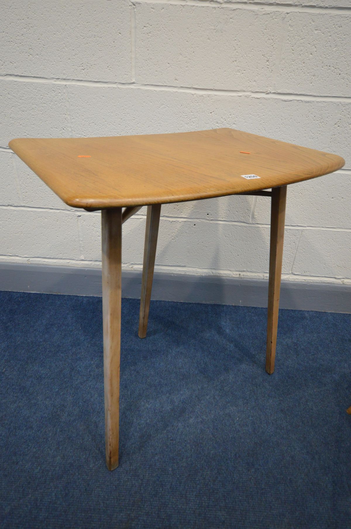 AN ERCOL ELM AND BEECH MODEL 265 TABLE, the curved top on triple square tapered legs, width 68cm x - Image 2 of 6