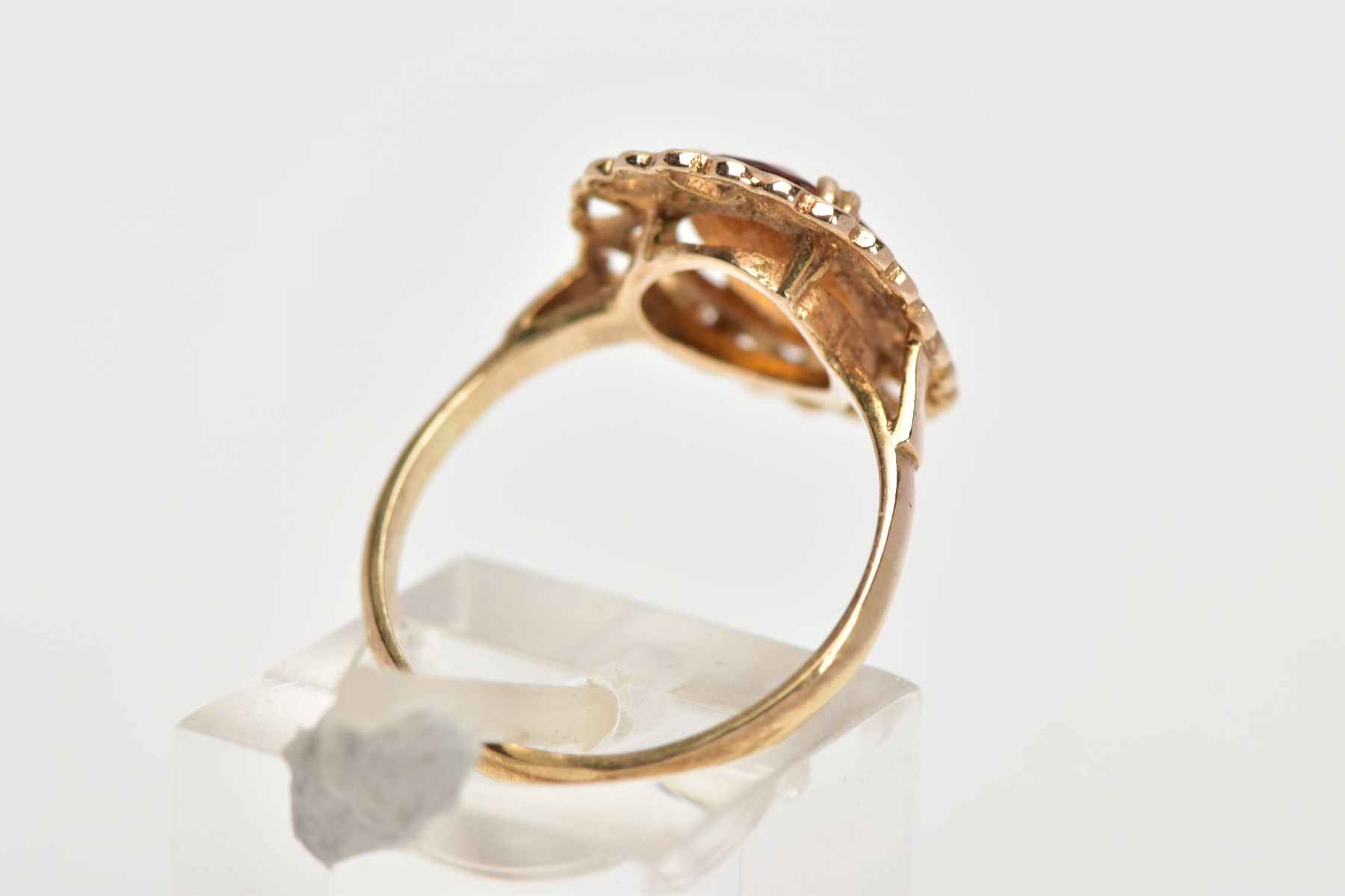 A YELLOW METAL CITRINE RING, designed with a claw set oval cut citrine, within an openwork heart - Image 3 of 4