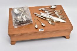 A COMPLETE CANTEEN OF CUTLERY, wooden canteen raised slightly on four wooden feet, complete with