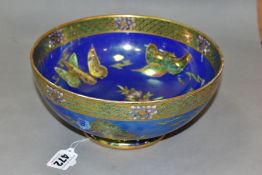 A MALING POTTERY FOOTED BOWL, the purple iridescent ground printed with kingfishers and