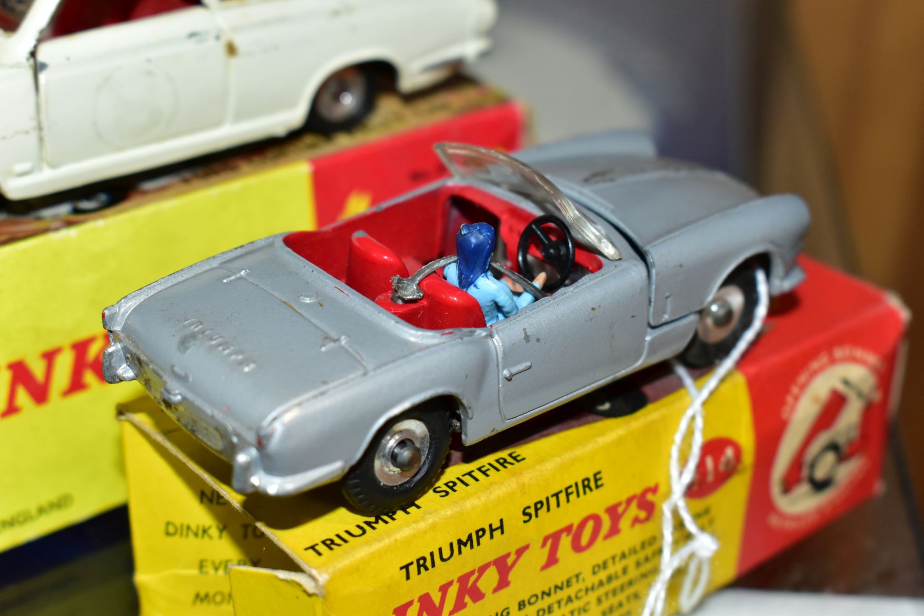 THREE BOXED DINKY TOYS CARS, Truimph Spitfire, No 114 metallic silver grey body, red interior, - Image 3 of 9