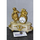 A MID 19TH CENTURY FRENCH GILT METAL AND ALABASTER FIGURAL MANTEL CLOCK, cast with a girl holding