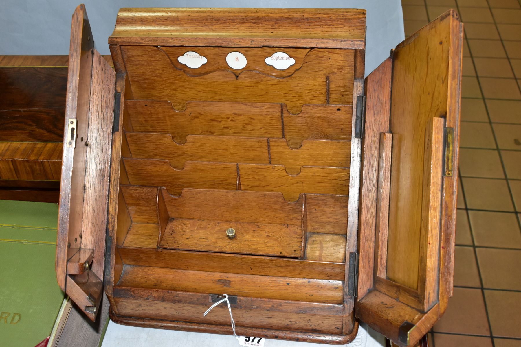 AN EDWARDIAN OAK STATIONERY BOX, hinged top above sloped double doors opening to reveal a fitted - Image 2 of 7