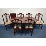 A MODERN MAHOGANY DINING TABLE and six chairs including two carvers (7)