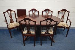 A MODERN MAHOGANY DINING TABLE and six chairs including two carvers (7)