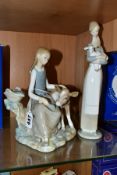 TWO LLADRO FIGURES OF GIRLS WITH ANIMALS, comprising 'Girl with Calf' No. 4513, issued 1969-1978,