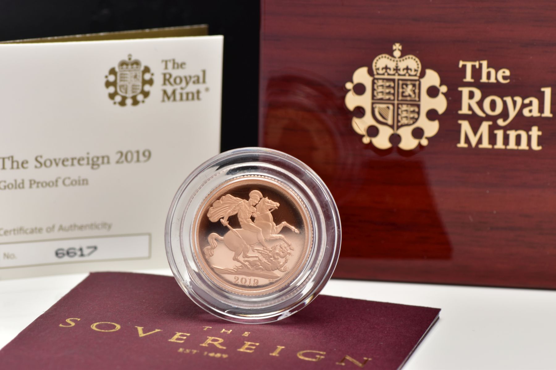 A ROYAL MINT BOXED WITH A C.O.A. 2019 GOLD PROOF SOVEREIGN including a sovereign booklet