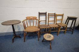 AN EARLY 20TH CENTURY ELM AND BEECH SMOKERS CHAIR, along with a Period pine high stool, carved