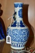 A CHINESE PORCELAIN BLUE AND WHITE TWIN HANDLED BALUSTER VASE, decorated with foliate scrolls,