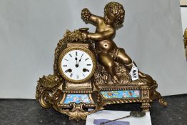 A 19TH CENTURY AND LATER GILT METAL FIGURAL MANTEL CLOCK, cast with a putti and fruiting vine, white
