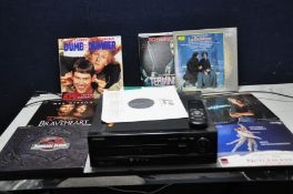A PIONEER CLD-D515 LASER DISC AND CD PLAYER with remote and eight LaserDiscs including Jurassic