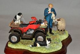 A BORDER FINE ARTS STUDIO SCULPTURE (BORDER COLLIE AND SHEEP) A5893 'A Helping Hand', mounted on a