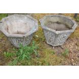 A PAIR OF OCTAGONAL TAPERING COMPOSITE GARDEN PLANTERS with dry stone wall effect panels to each