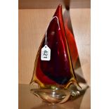 A MURANO OBALL TRI COLOUR GLASS YACHT, the sail in red, blue and amber with a clear base, bears