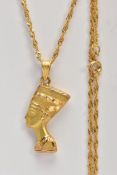 A YELLOW METAL PENDANT NECKLACE, the pendant in the form of the Egyptian Queen Nefertiti fitted with