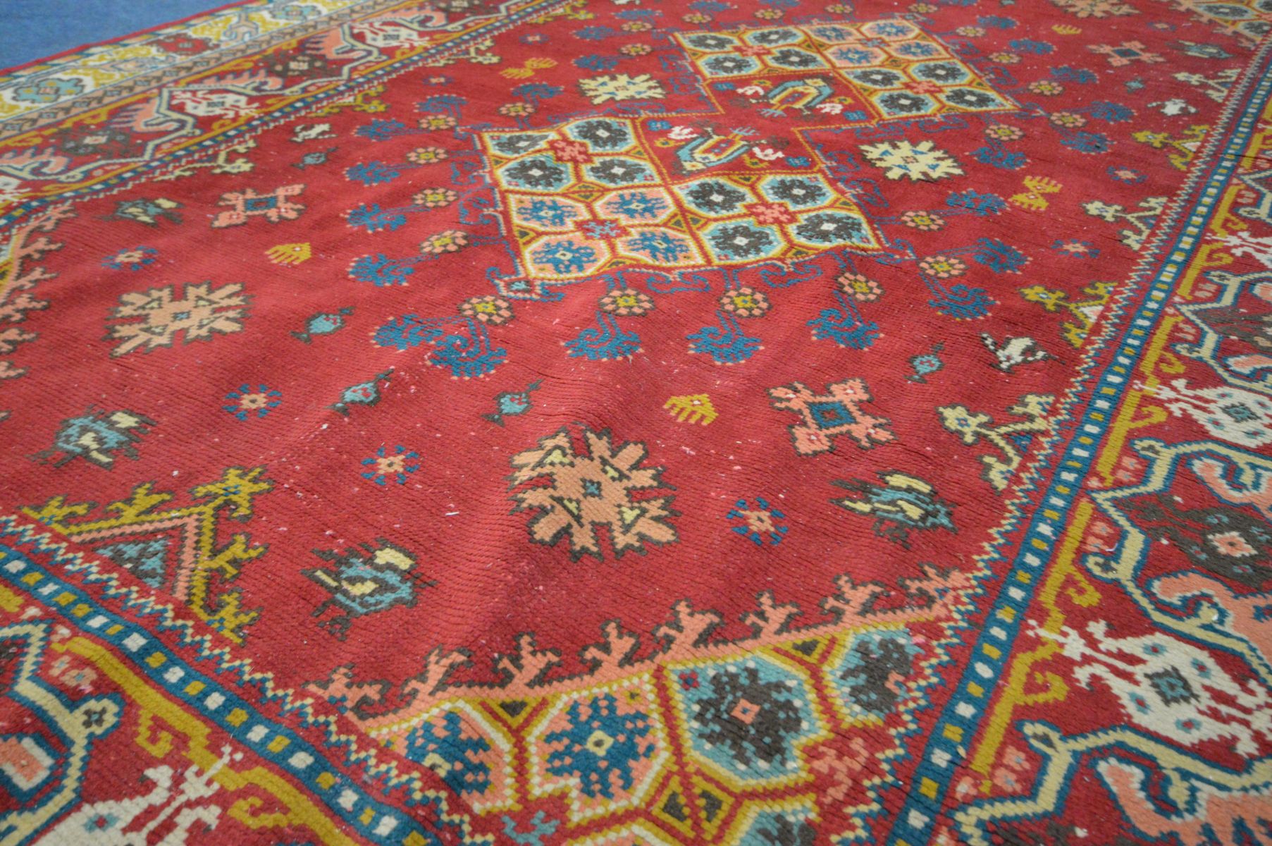 A WOOLLEN PERSIAN BAKSHAISH RUG, geometric motif within a red field, and a multi strap border, 297cm - Image 3 of 5