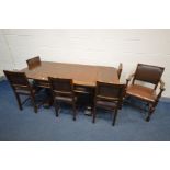 AN EARLY TO MID 20TH CENTURY OAK DRAW LEAF TABLE, a deep frieze, on acorn legs and H stretcher, open