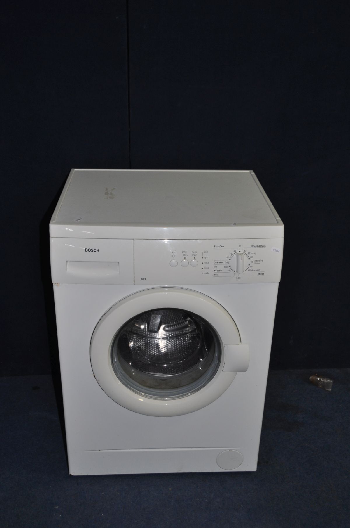 A BOSCH 1200 WASHING MACHINE (PAT pass and powers up not tested any further)