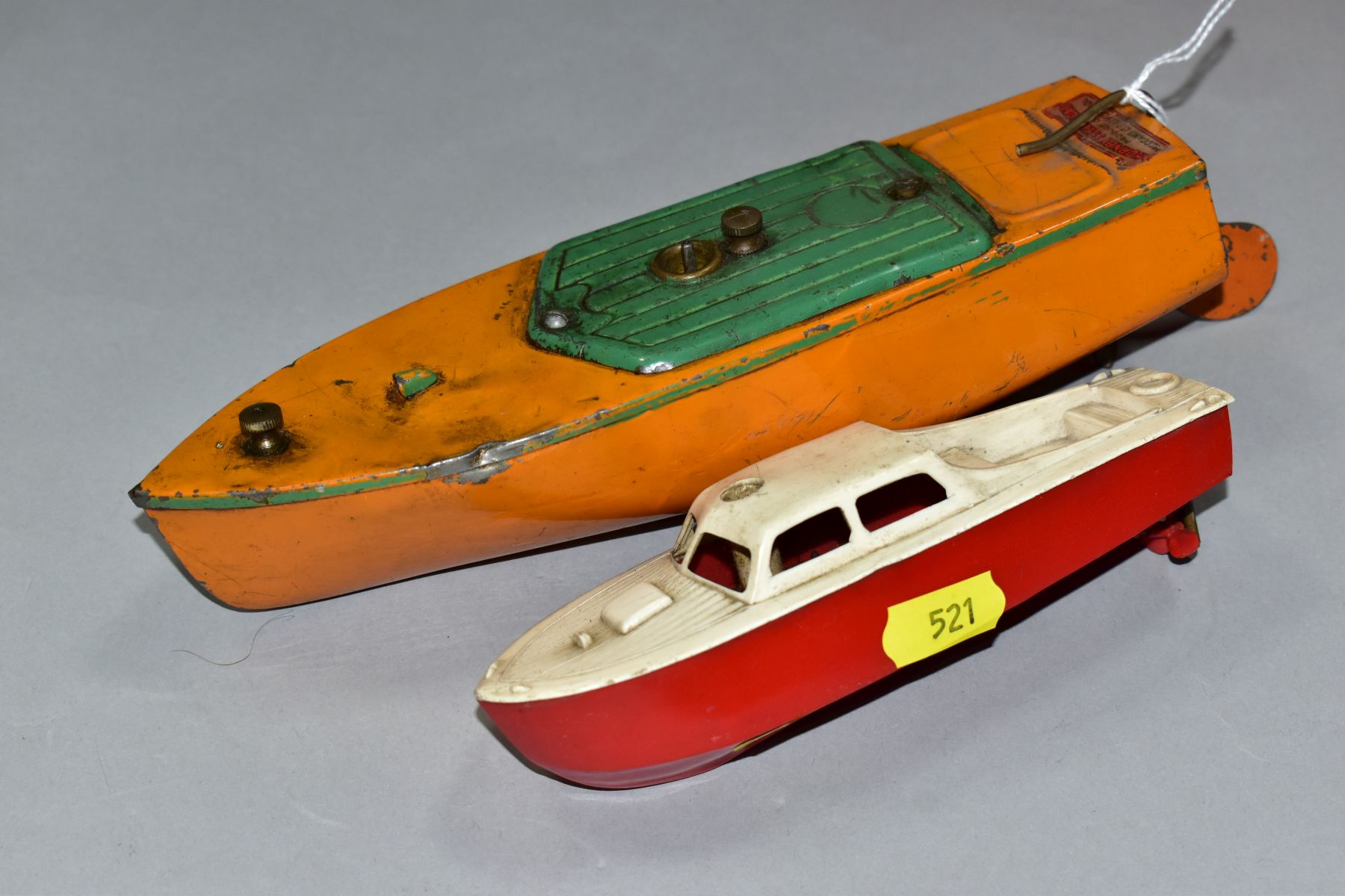 AN UNBOXED HORNBY TINPLATE CLOCKWORK SPEEDBOAT, 'Martin', missing key, orange with green hatch - Image 5 of 6