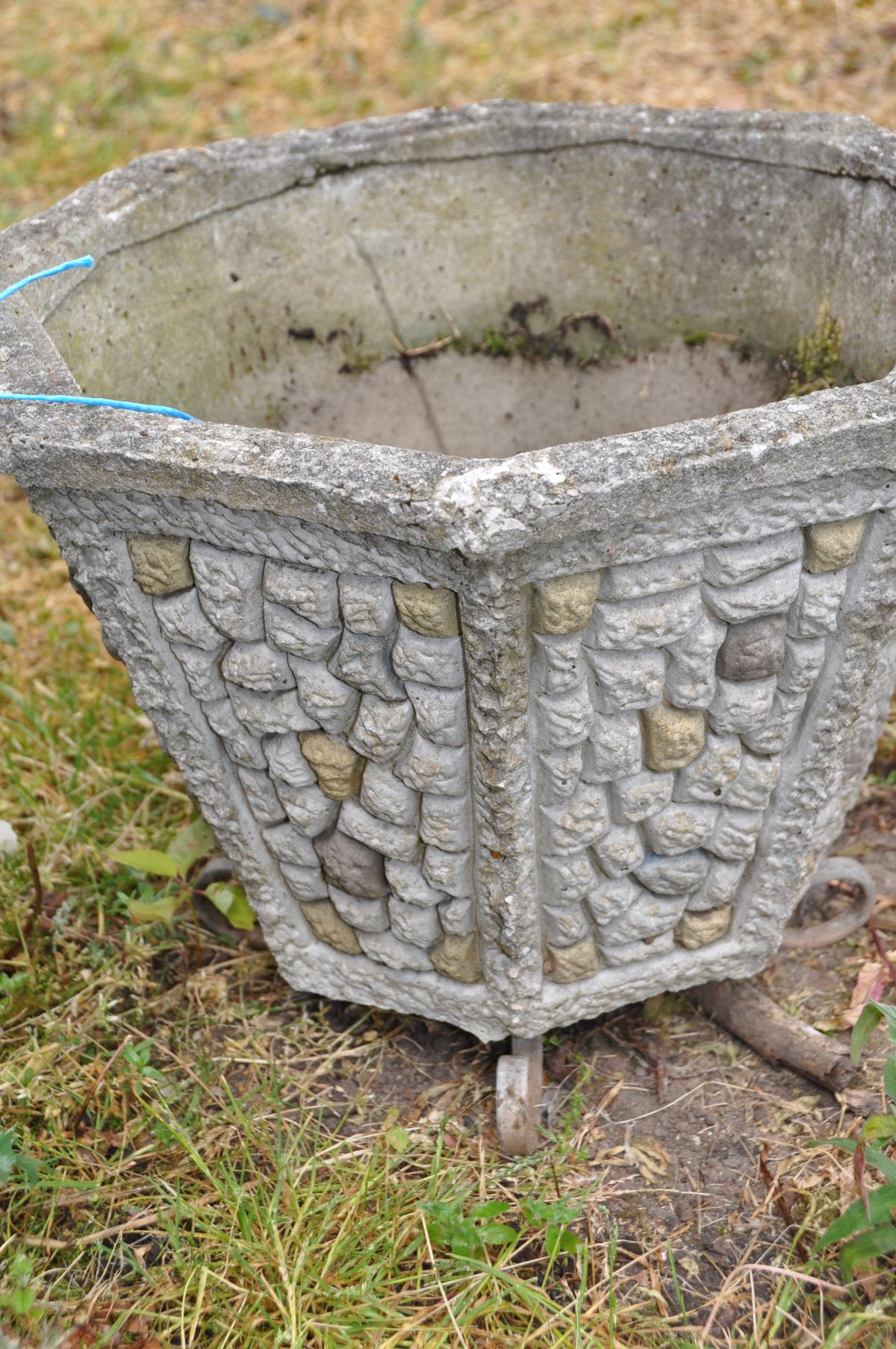 A PAIR OF OCTAGONAL TAPERING COMPOSITE GARDEN PLANTERS with dry stone wall effect panels to each - Image 2 of 2