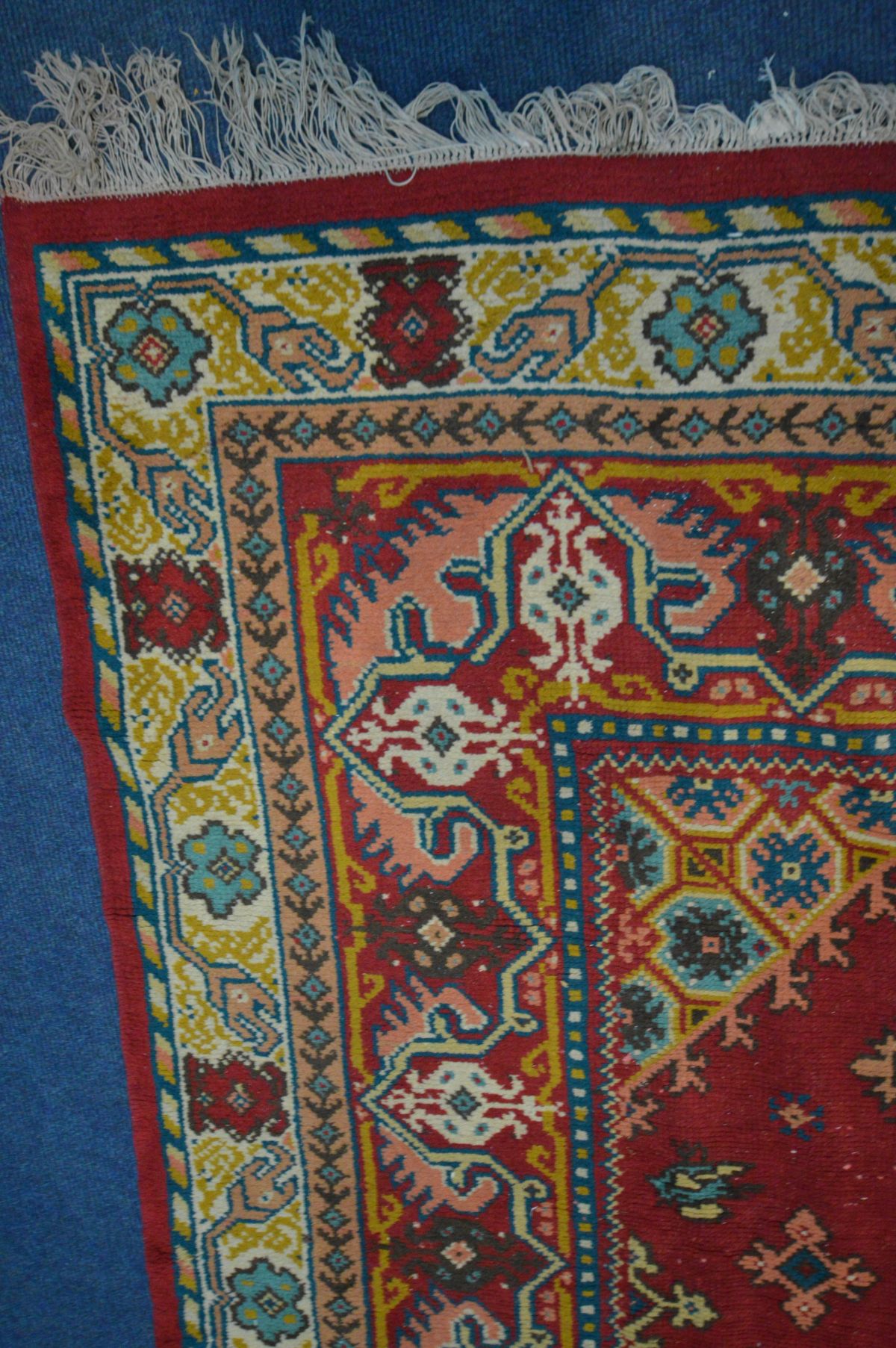 A WOOLLEN PERSIAN BAKSHAISH RUG, geometric motif within a red field, and a multi strap border, 297cm - Image 2 of 5