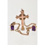 A YELLOW METAL CROSS PENDANT NECKLACE AND A PAIR OF YELLOW METAL AMETHYST STUD EARRINGS, the