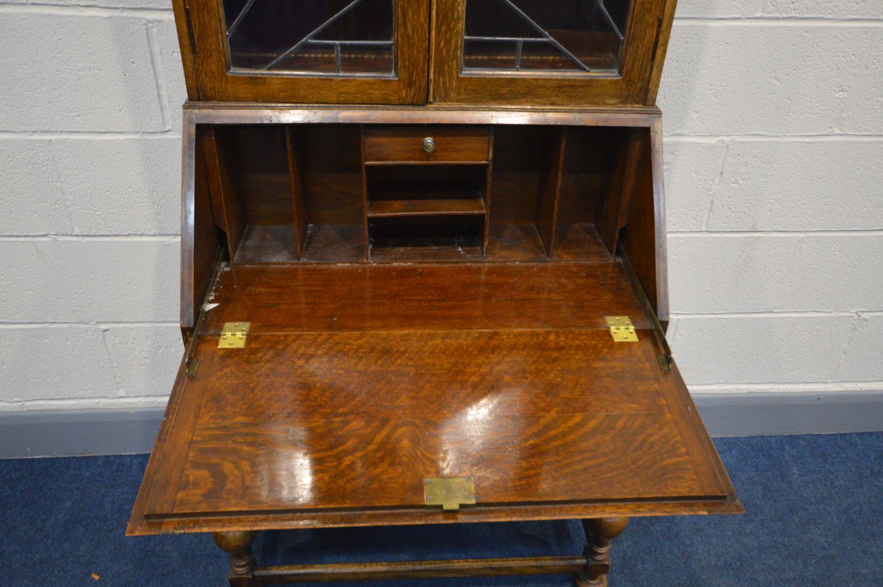 A EARLY TO MID 20TH CENTURY OAK BUREAU BOOKCASE, the top section with Art Deco lead glazed doors, - Image 2 of 3