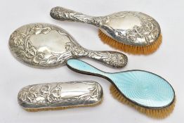 A THREE-PIECE VANITY SET AND A GUILLOCHE ENAMEL HAIRBRUSH, the three-piece set comprising of a