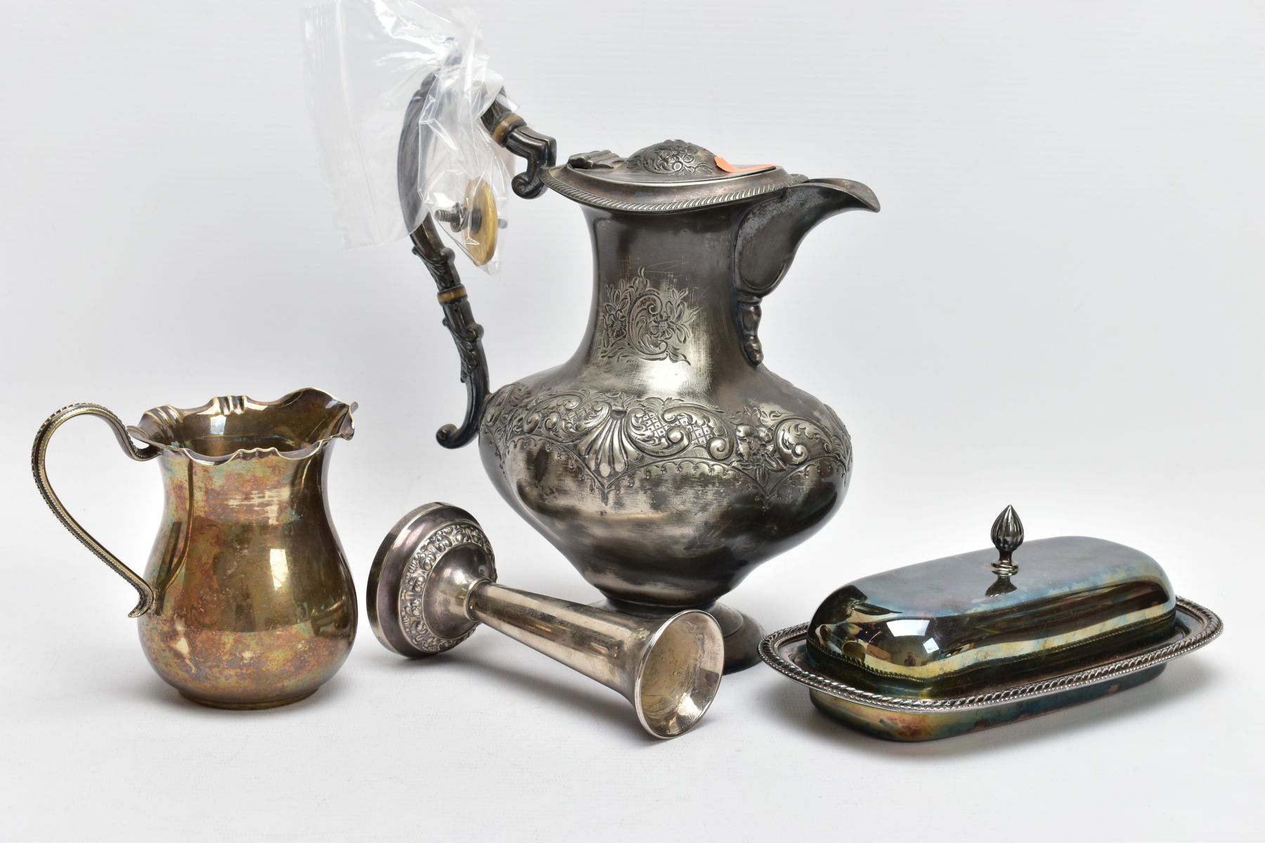 A SELECTION OF ITEMS, to include an AF, white metal floral and foliate embossed water jug, ( - Image 2 of 3