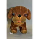 A MERRYTHOUGHT DINKIE DOG, brown and cream velour, replacement eyes, well loved with some repairs,