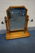 A LATE 19TH CENTURY PITCH PINE AND OAK ECCLESIASTICAL TOILET MIRROR in the manner of A.W.N Pugin,