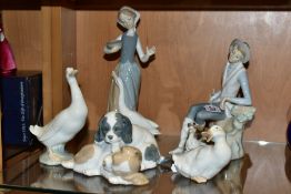TWO LLADRO FIGURES AND THREE NAO FIGURES, comprising 1052 'Girl with Duck', designed by Vincente