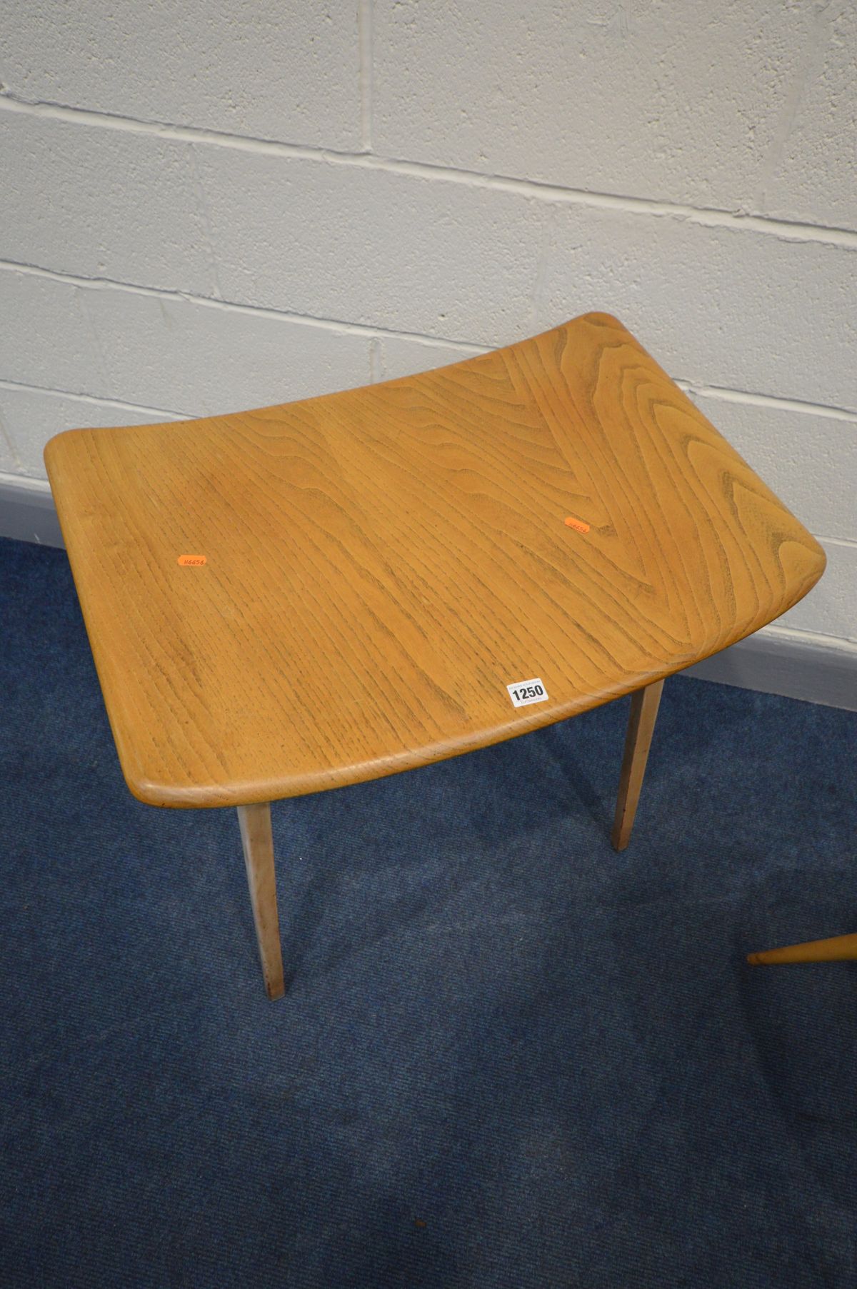 AN ERCOL ELM AND BEECH MODEL 265 TABLE, the curved top on triple square tapered legs, width 68cm x - Image 3 of 6