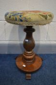 A VICTORIAN MAHOGANY SWIVEL TOP PIANO STOOL