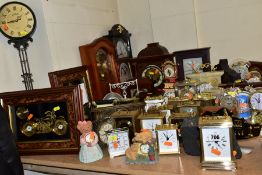 A COLLECTION OF CLOCKS AND TIMEPIECES, including wall clocks, mantel clocks, novelty clocks, etc,