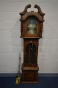 A MODERN OAK CHIMING LONGCASE CLOCK, swan neck pediment to hood, arch glazed door enclosing a