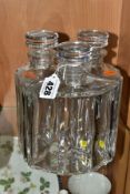 A SET OF THREE 20TH CENTURY BACCARAT CLEAR GLASS DECANTERS, each decanter of triangular form with