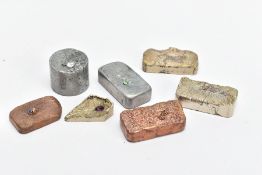 SEVEN HANDMADE INGOTS, to include two grey coloured, three yellow coloured and three bronze