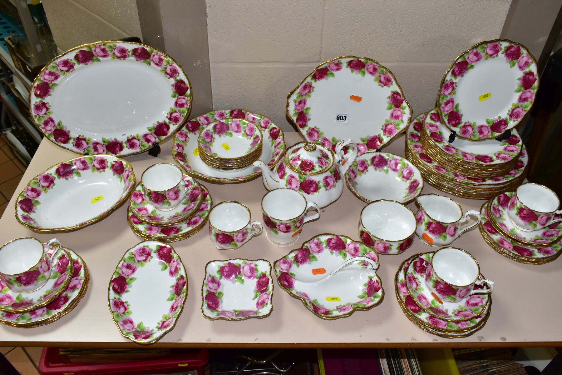 A QUANTITY OF ROYAL ALBERT OLD ENGLISH ROSE TEA AND DINNERWARES, comprising five tea cups (one