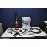 A HOOVER AQUAMASTER WET AND DRY VACUUM CLEANER with accessories and a Ewbank Chili vacuum